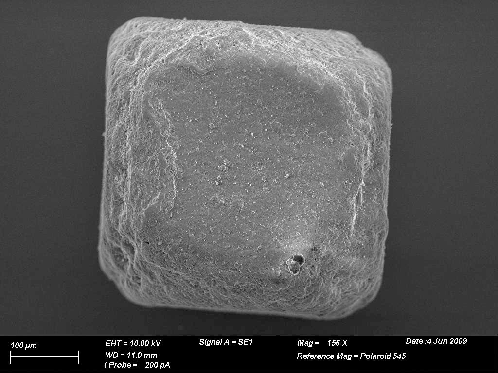 A microscopic photograph of a grain of salt.